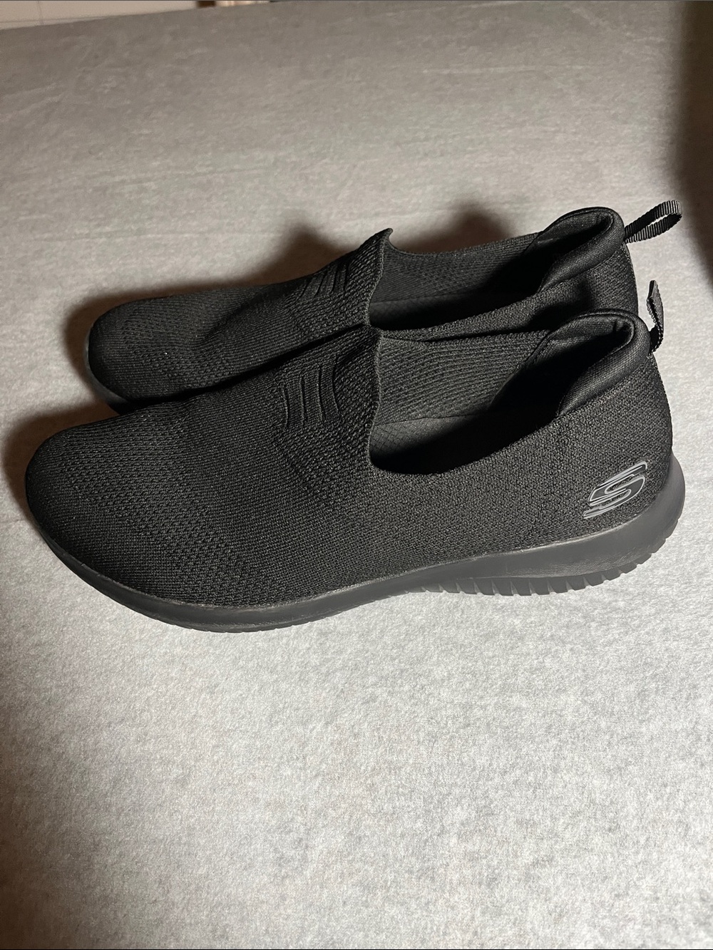 Skechers Women's All-Black Slip-On Knit Sneakers